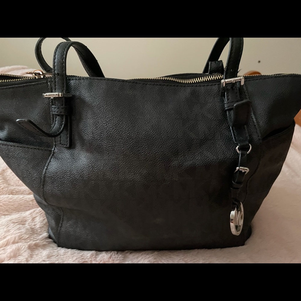 MK bag used shoulder straps are a little worn